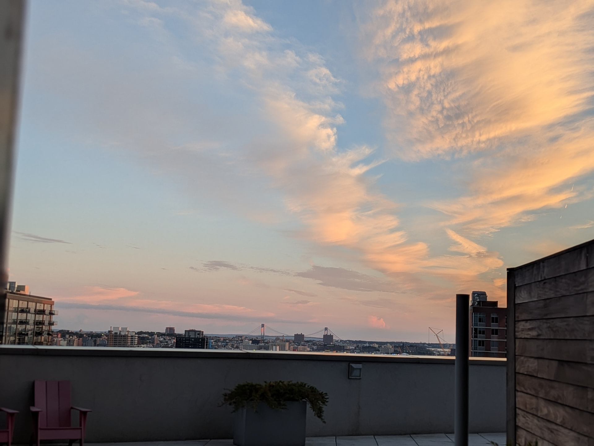Brooklyn rooftop terrace at sunset where the VisionGuide Retreat takes place